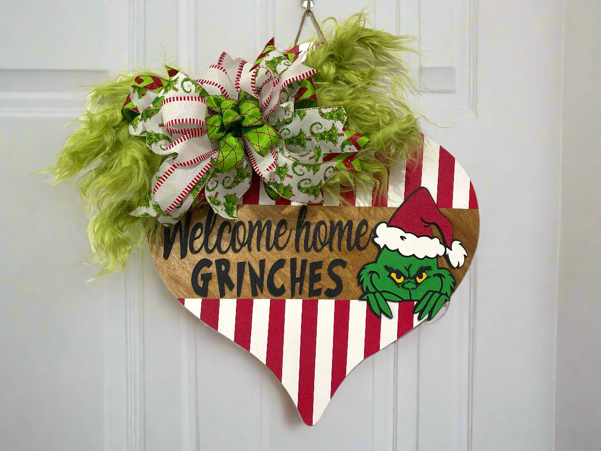 "Welcome Home, Grinches" Doorhanger