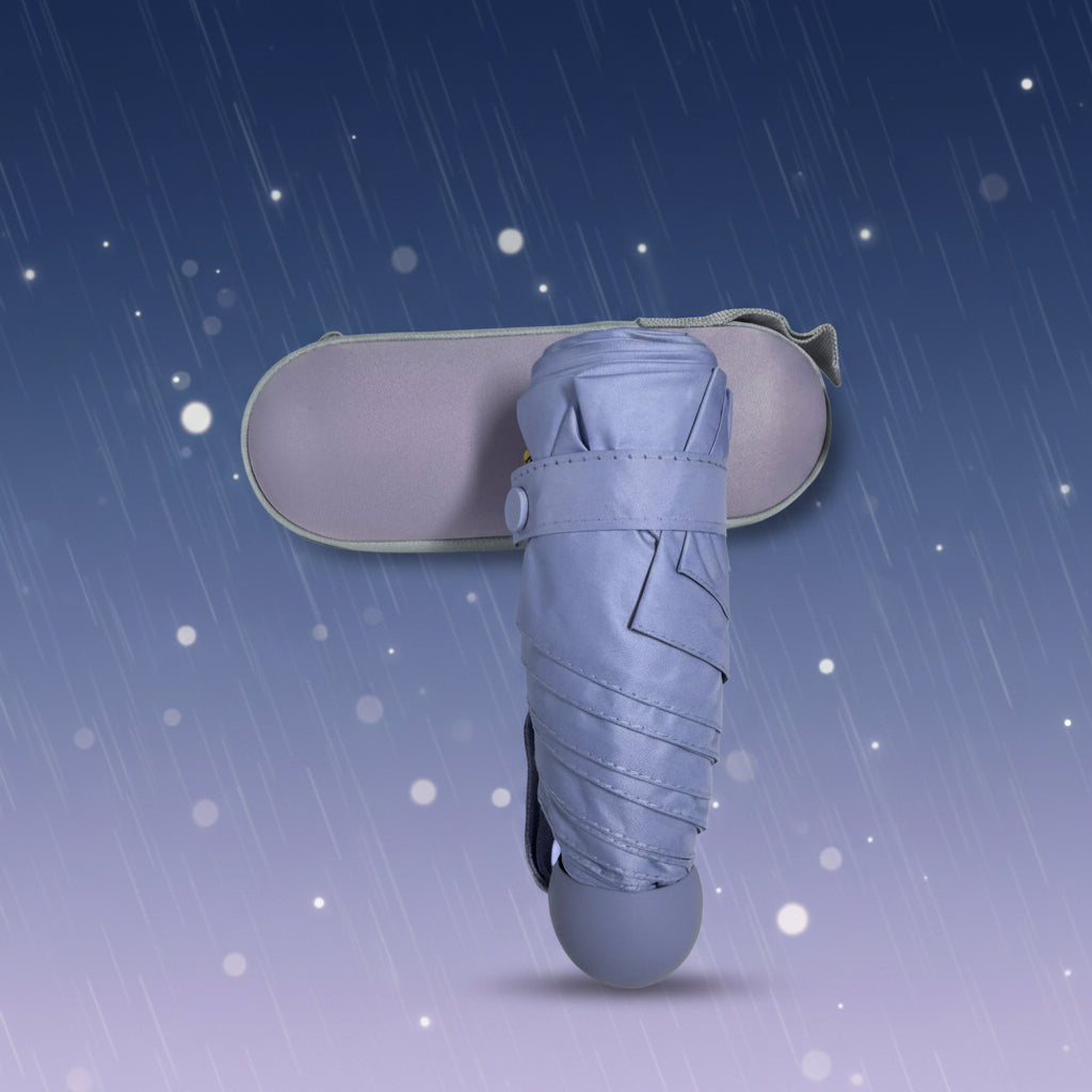 Compact umbrella with carrying case