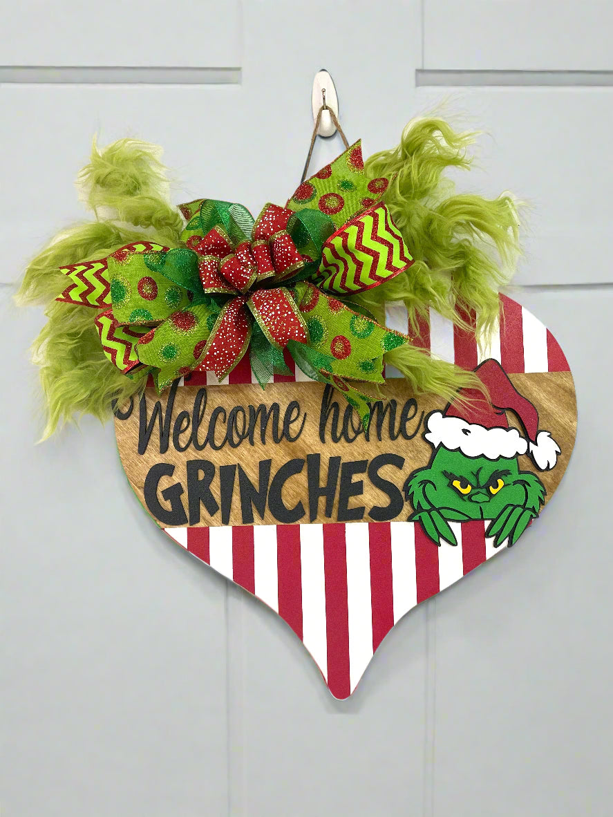 "Welcome Home, Grinches" Doorhanger