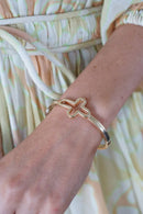 Open Cross Hinge Bangle in Shiny Gold